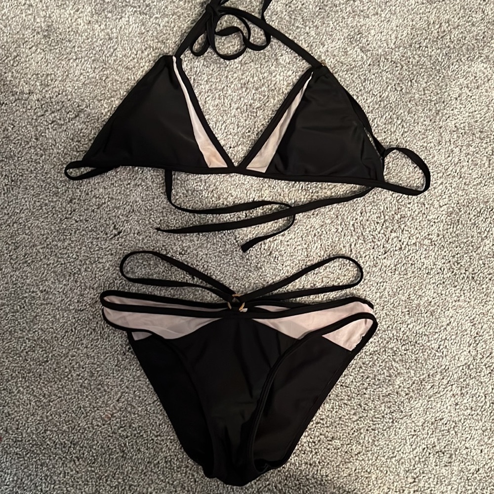 black triangle strappy bikini with white netting